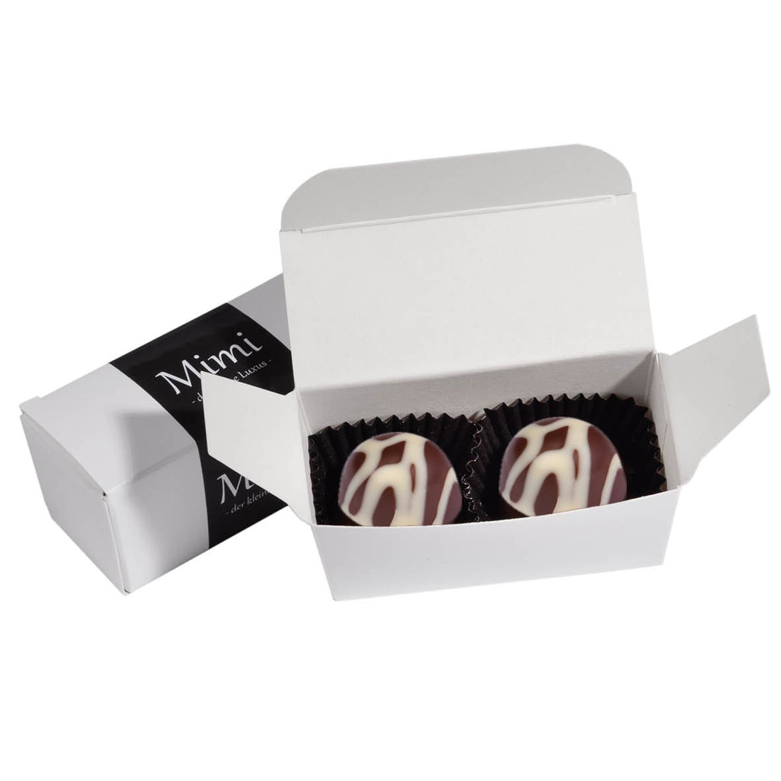 2 Pralinen in edler Kartonage – Crème brûlée