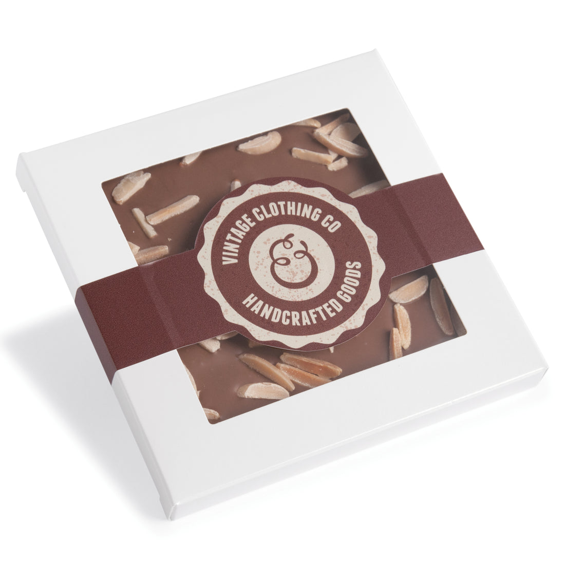 Handgeschöpfte Schokolade in quadratischer Kartonage mit Sichtfenster